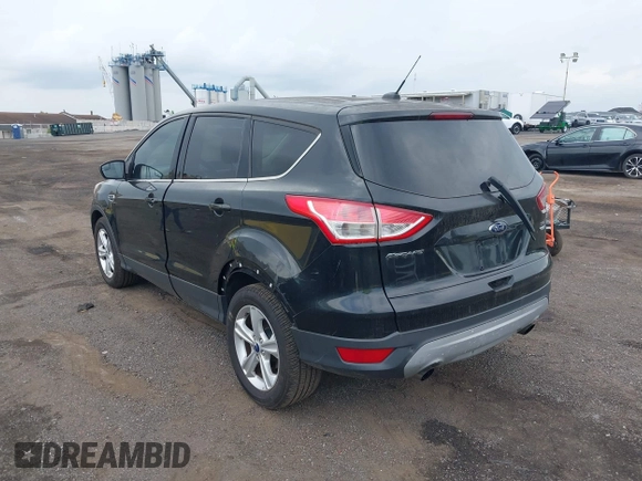 2013 Ford Escape SE with VIN 1FMCU9G99DUD71887, listed as a IAAI auction lot 42689284 with 70,662 mi miles and . Bid and sale history available at DreamBid. Image 3.