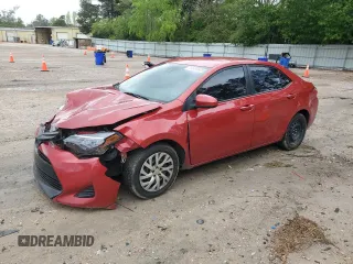 2019 Toyota Corolla L z VIN 5YFBURHE2KP939340, wystawiony jako Copart lot #52499825 z przebiegiem 176 306 mil mil oraz Szkoda całkowita • Salvage title. Historia ofert i sprzedaży dostępna na DreamBid. Obrazek 1.