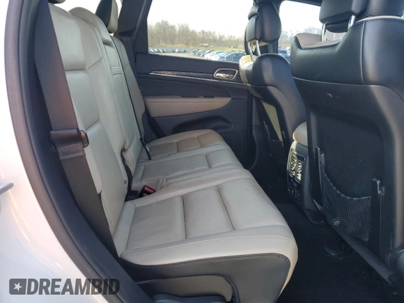 2016 Jeep Grand Cherokee Limited 75th Anniversary with VIN 1C4RJFBG3GC350068, listed as a Copart auction lot 52554675 with 109,985 mi miles and Salvage Title. Bid and sale history available at DreamBid. Image 11.
