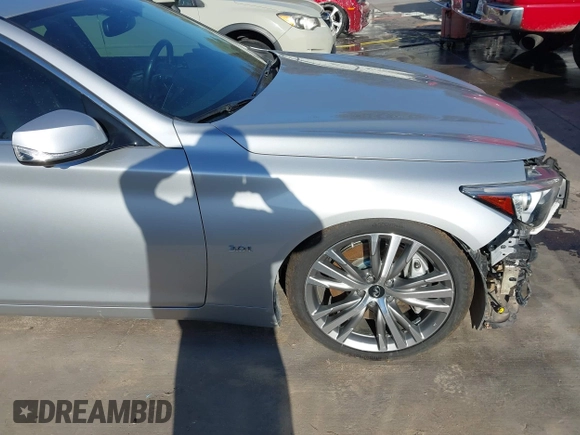 2019 Infiniti Q50 Luxe z VIN JN1EV7AP4KM518705, wystawiony jako IAAI lot #40957491 z przebiegiem 49 576 mil mil oraz . Historia ofert i sprzedaży dostępna na DreamBid. Obrazek 19.