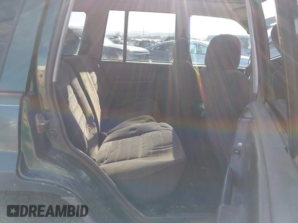 1998 Jeep Grand Cherokee Laredo with VIN 1J4GZ58S5WC362365, listed as a IAAI auction lot 41891397 with 246,673 mi miles. Bid and sale history available at carsss.com. Image 8.