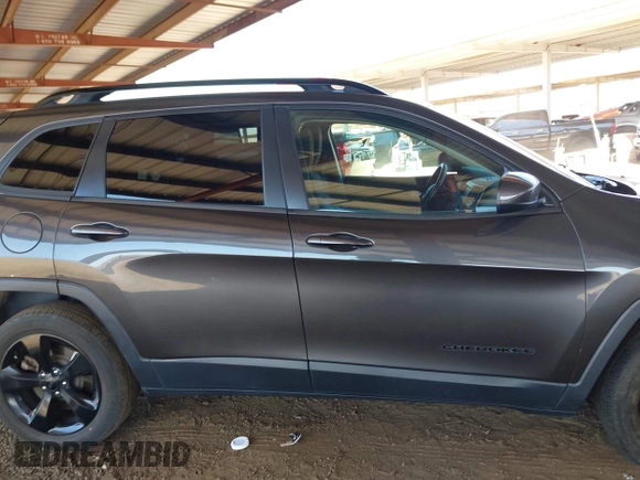 2016 Jeep Cherokee Latitude with VIN 1C4PJLCS4GW184621, listed as a IAAI auction lot 42007342 with 120,609 mi miles and . Bid and sale history available at DreamBid. Image 13.