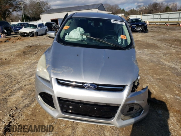 2013 Ford Escape SEL with VIN 1FMCU9HX7DUA60178, listed as a Copart auction lot 85203234 with 144,153 mi miles and Salvage Title. Bid and sale history available at carsss.com. Image 5.