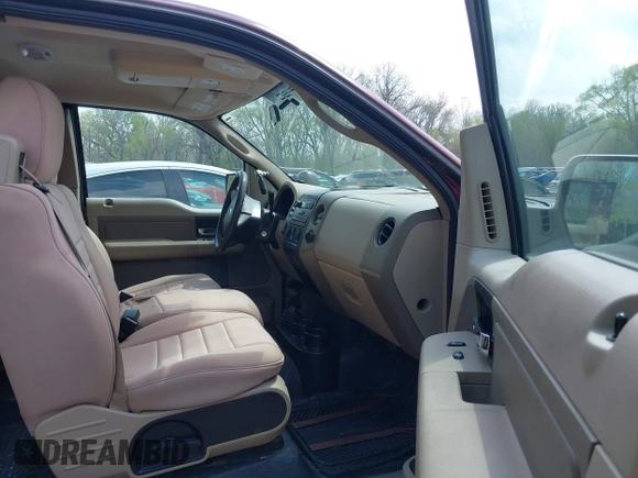 2005 Ford F-150 XLT with VIN 1FTPX14575KD79404, listed as a IAAI auction lot 42003073 with 212,050 mi miles. Bid and sale history available at carsss.com. Image 5.