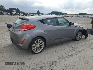 2013 Hyundai Veloster w/Red Int with VIN KMHTC6AD2DU132230, listed as a Copart auction lot 60237225 with 111,218 mi miles and Salvage title. Bid and sale history available at DreamBid. Image 3.