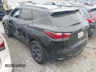 2021 Chevrolet Blazer RS z VIN 3GNKBERS4MS523208, wystawiony jako IAAI lot #42078498 z przebiegiem 63 851 mil mil oraz . Historia ofert i sprzedaży dostępna na DreamBid. Obrazek 3.