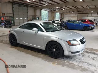 2000 Audi TT z VIN TRUUC28N3Y1026477, wystawiony jako IAAI lot #42367016 z przebiegiem 136 182 mil mil oraz . Historia ofert i sprzedaży dostępna na DreamBid. Obrazek 1.