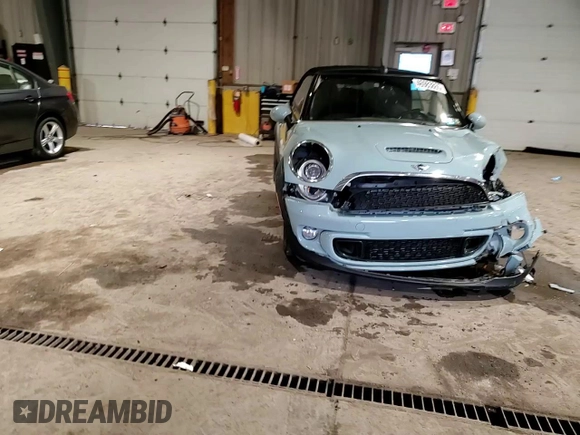 2014 MINI Convertible S с VIN WMWZP3C59ET707581, выставлен на аукционе Copart как лот 46983865 с пробегом 42 746 миль миль и Списание • Salvage title. История ставок и продаж доступна на DreamBid. Изображение 11.