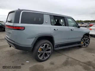 2023 Rivian R1S Adventure with VIN 7PDSGABA4PN011024, listed as a Copart auction lot 72703154 with 14,043 mi miles and Salvage Title. Bid and sale history available at carsss.com. Image 3.