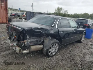 2004 Jaguar XJ VDP with VIN SAJWA74C64SG27143, listed as a Copart auction lot 71373744 with 129,942 mi miles and Salvage Title. Bid and sale history available at carsss.com. Image 3.