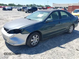 2002 Toyota Camry LE z VIN 4T1BE32K02U587544, wystawiony jako IAAI lot #42291358 z przebiegiem Nie podano mil oraz . Historia ofert i sprzedaży dostępna na DreamBid. Obrazek 2.