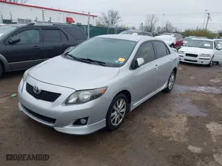 2010 Toyota Corolla with VIN 2T1BU4EEXAC432515, listed as a IAAI auction lot 42019459 with 267,404 mi miles. Bid and sale history available at carsss.com. Image 2.