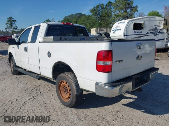2005 Ford F-150 STX with VIN 1FTRX12W75NB89587, listed as a IAAI auction lot 41834540 with 326,100 mi miles. Bid and sale history available at carsss.com. Image 3.