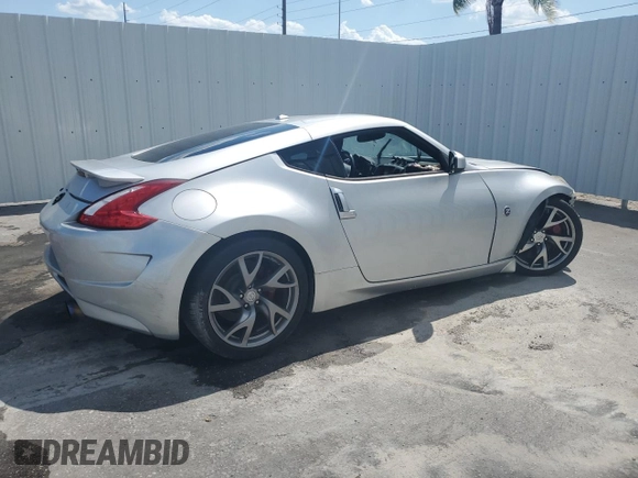 2016 Nissan 370Z Sport с VIN JN1AZ4EH9GM934860, выставлен на аукционе Copart как лот 54613555 с пробегом Не указан миль и Чистый • Clean title. История ставок и продаж доступна на DreamBid. Изображение 3.