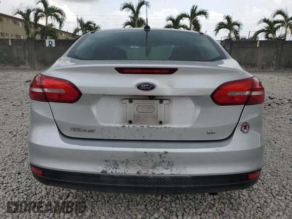 2018 Ford Focus SE with VIN 1FADP3F28JL256318, listed as a Copart auction lot 55524544 with 136,723 mi miles and Salvage title. Bid and sale history available at DreamBid. Image 6.