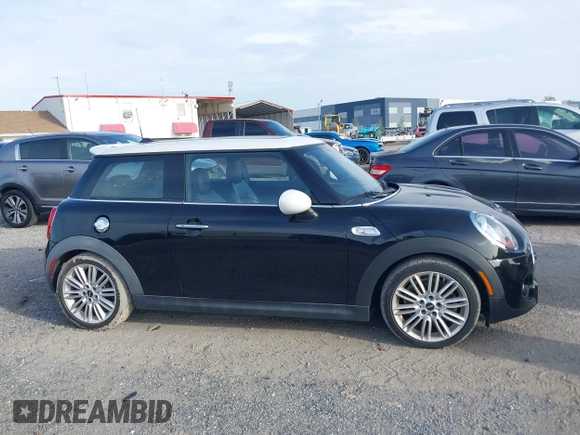 2016 MINI Hardtop S with VIN WMWXP7C53G2A42932, listed as a IAAI auction lot 42461469 with 76,038 mi miles and . Bid and sale history available at DreamBid. Image 13.