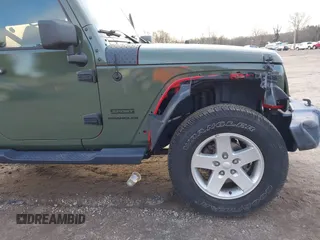 2016 Jeep Wrangler Sport with VIN 1C4AJWAG7GL330159, listed as a IAAI auction lot 41530415 with 98,554 mi miles and . Bid and sale history available at carsss.com. Image 17.
