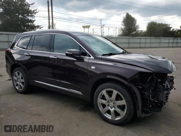 2020 Cadillac XT6 AWD Premium Luxury with VIN 1GYKPDRS0LZ134789, listed as a Copart auction lot 60782245 with 61,138 mi miles and Salvage title. Bid and sale history available at DreamBid. Image 4.