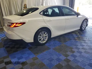 2025 Toyota Camry LE with VIN 4T1DAACKXSU501647, listed as a Copart auction lot 54232915 with 21,997 mi miles and Clean Title. Bid and sale history available at carsss.com. Image 3.