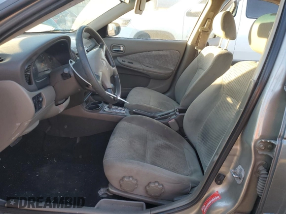 2000 Nissan Sentra XE with VIN 3N1CB51D3YL316712, listed as a Copart auction lot 84512254 with 228,070 mi miles and Salvage title. Bid and sale history available at DreamBid. Image 7.