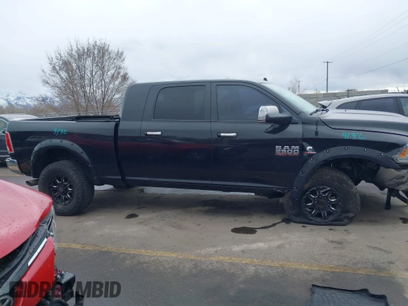 2015 Ram 2500 Laramie with VIN 3C6UR5NL2FG614941, listed as a IAAI auction lot 41785882 with 155,061 mi miles and . Bid and sale history available at DreamBid. Image 13.