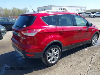2015 Ford Escape Titanium with VIN 1FMCU9J90FUB00714, listed as a IAAI auction lot 42057717 with 61,223 mi miles. Bid and sale history available at carsss.com. Image 4.