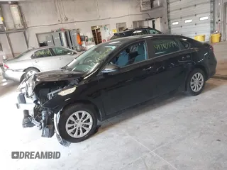 2023 Kia Forte LXS with VIN 3KPF24ADXPE632437, listed as a IAAI auction lot 41780579 with 35,197 mi miles. Bid and sale history available at carsss.com. Image 2.