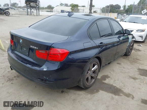 2014 BMW 3 Series 328i with VIN WBA3C1C56EK108665, listed as a IAAI auction lot 42101319 with 84,928 mi miles and . Bid and sale history available at DreamBid. Image 4.
