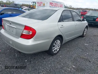 2002 Toyota Camry LE z VIN 4T1BE32K42U625244, wystawiony jako IAAI lot #42036561 z przebiegiem 155 880 mil mil oraz . Historia ofert i sprzedaży dostępna na DreamBid. Obrazek 4.