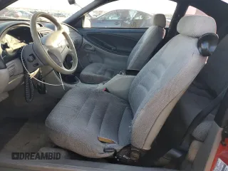 1996 Ford Mustang with VIN 1FALP4041TF234741, listed as a Copart auction lot 85277894 with 113,353 mi miles and Salvage Title. Bid and sale history available at carsss.com. Image 7.