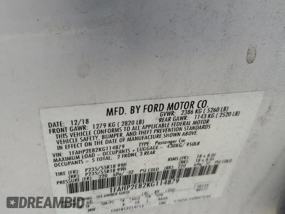 2019 Ford Taurus SEL with VIN 1FAHP2E82KG114879, listed as a Copart auction lot 80266574 with 75,561 mi miles and Salvage Title. Bid and sale history available at DreamBid. Image 12.