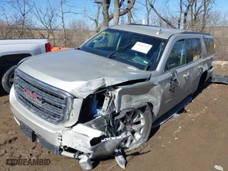 2016 GMC Yukon XL SLE with VIN 1GKS2FKC9GR458451, listed as a IAAI auction lot 41664562 with 196,400 mi miles. Bid and sale history available at carsss.com. Image 2.
