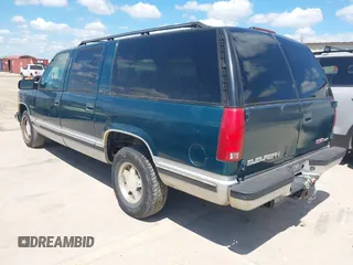 1995 GMC Suburban with VIN 1GKEC16KXSJ712111, listed as a IAAI auction lot 42185423 with 269,010 mi miles and . Bid and sale history available at DreamBid. Image 3.