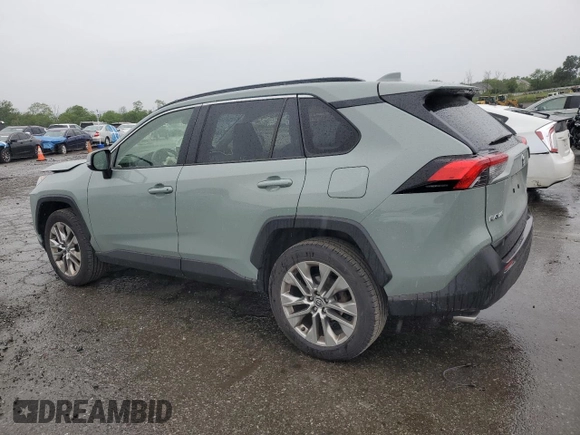 2021 Toyota RAV4 XLE Premium with VIN JTMA1RFV0MD074834, listed as a Copart auction lot 58466965 with 71,623 mi miles and Salvage title. Bid and sale history available at DreamBid. Image 2.