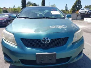 2009 Toyota Corolla with VIN 1NXBU40E39Z047881, listed as a IAAI auction lot 42078719 with 204,258 mi miles. Bid and sale history available at carsss.com. Image 12.