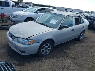 2002 Toyota Corolla CE with VIN 1NXBR12E12Z639542, listed as a IAAI auction lot 41535788 with 204,999 mi miles and . Bid and sale history available at DreamBid. Image 2.