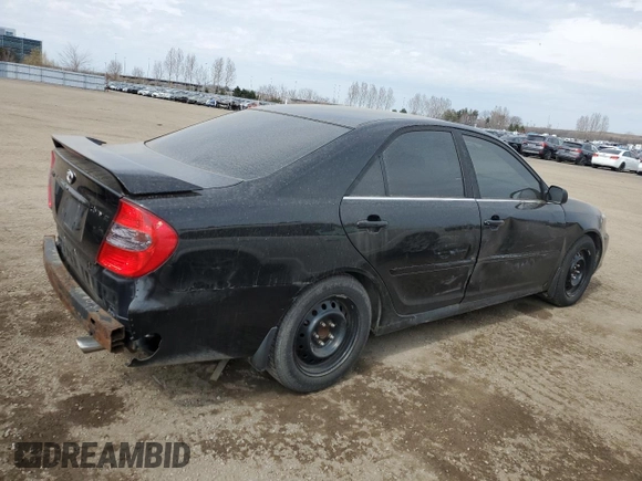 2004 Toyota Camry LE with VIN JTDBE32K940288536, listed as a Copart auction lot 54106555 with 246,661 mi miles and Clean Title. Bid and sale history available at DreamBid. Image 3.