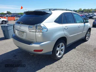 2006 Lexus RX 330 with VIN 2T2GA31U16C045926, listed as a IAAI auction lot 42063557 with 208,334 mi miles. Bid and sale history available at carsss.com. Image 4.