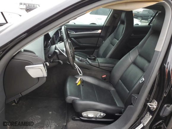 2016 Porsche Panamera 4 with VIN WP0AA2A73GL005632, listed as a Copart auction lot 77326773 with 71,385 mi miles. Bid and sale history available at carsss.com. Image 7.