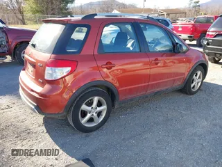 2009 Suzuki SX4 Touring AWD with VIN JS2YB417595100925, listed as a IAAI auction lot 41693882 with 76,972 mi miles and . Bid and sale history available at DreamBid. Image 4.