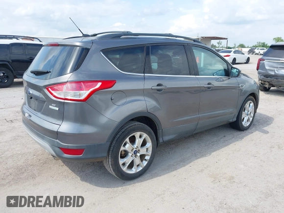 2013 Ford Escape SE with VIN 1FMCU0GXXDUD85470, listed as a IAAI auction lot 42142774 with 145,391 mi miles. Bid and sale history available at carsss.com. Image 4.