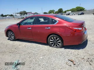 2017 Nissan Altima SV with VIN 1N4AL3AP1HC233782, listed as a Copart auction lot 61222445 with 137,254 mi miles and Salvage title. Bid and sale history available at DreamBid. Image 2.