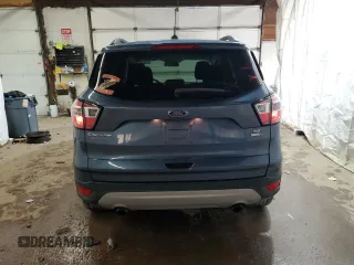 2018 Ford Escape SE z VIN 1FMCU9GD6JUC30324, wystawiony jako Copart lot #55833765 z przebiegiem 48 016 mil mil oraz Szkoda całkowita • Salvage title. Historia ofert i sprzedaży dostępna na DreamBid. Obrazek 6.