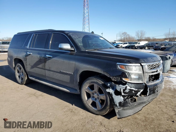 2015 Chevrolet Suburban LT with VIN 1GNSKJKC2FR274506, listed as a Copart auction lot 87881695 with 196,506 mi miles and Salvage Title. Bid and sale history available at DreamBid. Image 4.