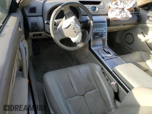 2004 Infiniti G35 Coupe w/Leather with VIN JNKCV54E14M814852, listed as a Copart auction lot 80864474 with 0 mi miles and Salvage Title. Bid and sale history available at carsss.com. Image 8.