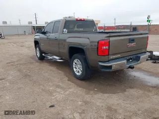 2014 GMC Sierra 1500 SLE with VIN 1GTV2UEC0EZ322425, listed as a IAAI auction lot 41433098 with 137,501 mi miles. Bid and sale history available at carsss.com. Image 3.