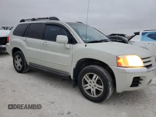 2004 Mitsubishi Endeavor XLS with VIN 4A4MM31S14E056988, listed as a Copart auction lot 84604114 with 153,434 mi miles and Salvage Title. Bid and sale history available at carsss.com. Image 4.