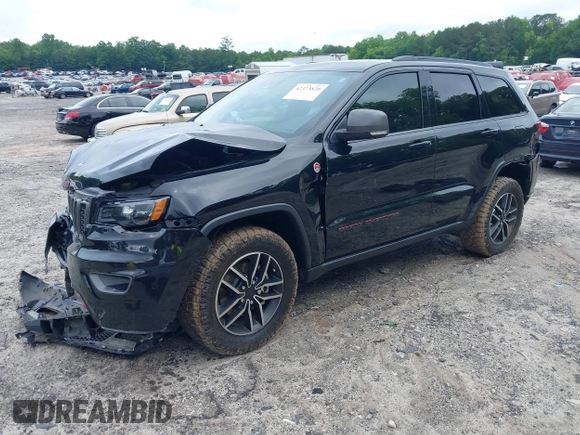 2020 Jeep Grand Cherokee Trailhawk with VIN 1C4RJFLG4LC387459, listed as a IAAI auction lot 42373820 with 55,492 mi miles and . Bid and sale history available at DreamBid. Image 17.