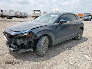 2023 Mazda CX-30 S Carbon Edition z VIN 3MVDMBCM5PM504078, wystawiony jako Copart lot #57475445 z przebiegiem 12 176 mil mil oraz Szkoda całkowita • Salvage title. Historia ofert i sprzedaży dostępna na DreamBid. Obrazek 1.