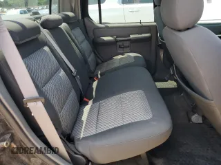 2005 Ford Explorer Sport Trac XLS with VIN 1FMZU67K65UA29830, listed as a Copart auction lot 54941185 with 214,220 mi miles and Salvage title. Bid and sale history available at DreamBid. Image 10.